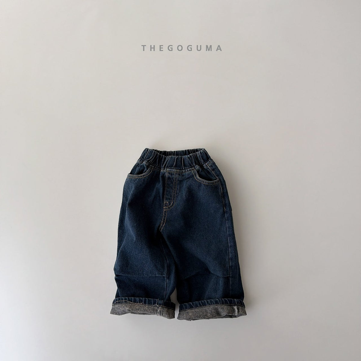 The goguma ポイントタック裏起毛デニムパンツ
