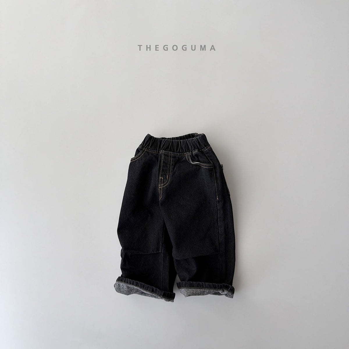 The goguma ポイントタック裏起毛デニムパンツ
