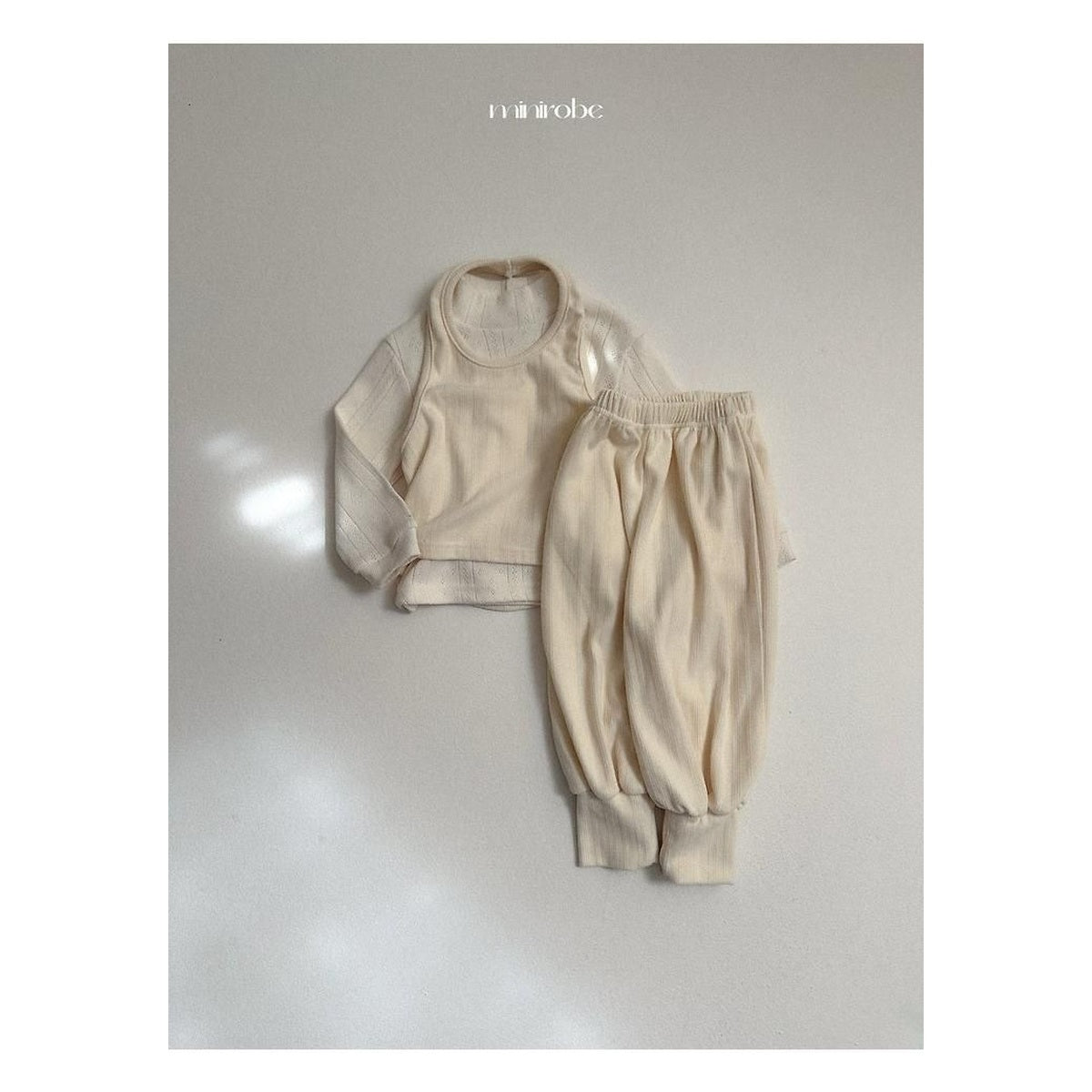 minirobe ルルホルターネックトップス