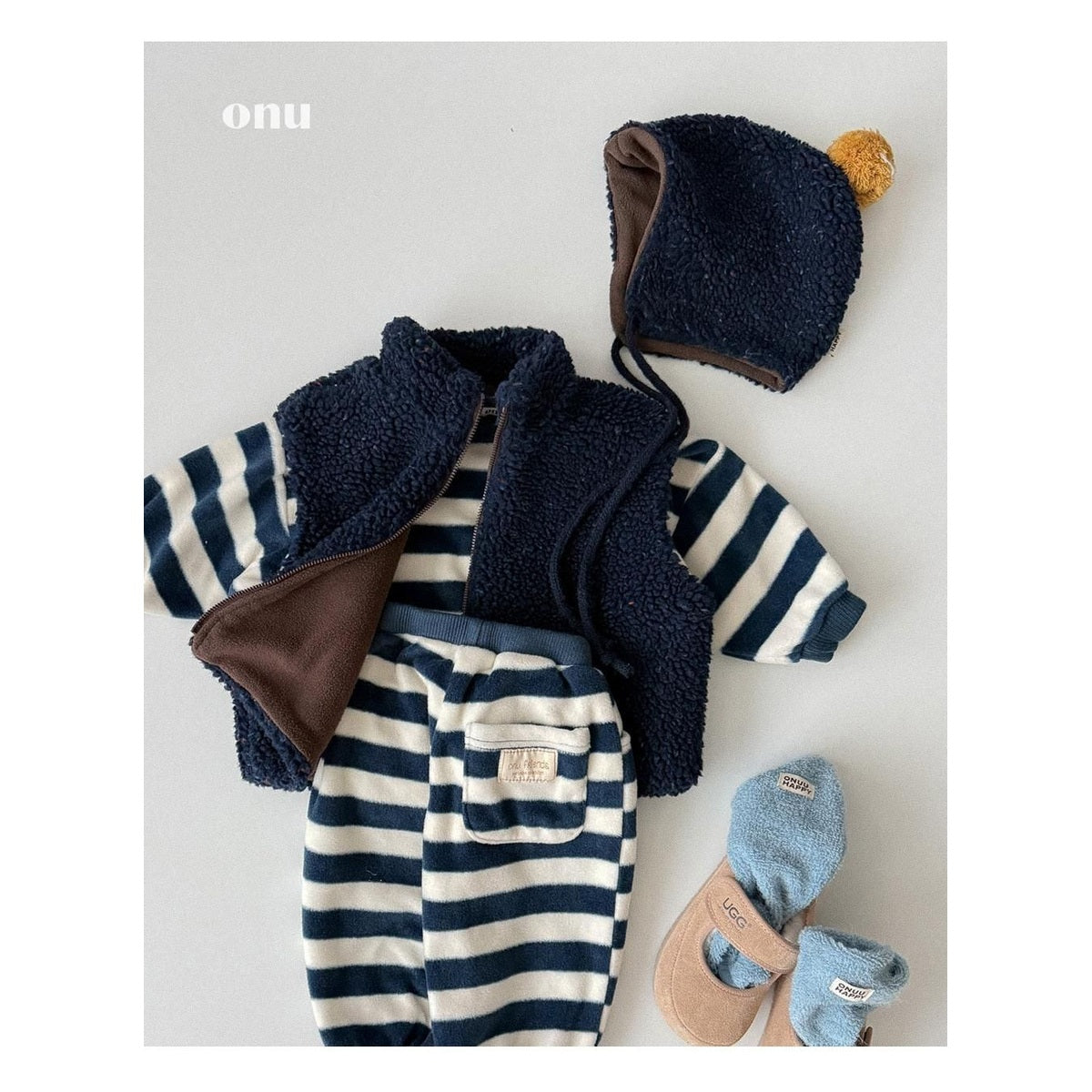 ONU ポンポン付きイヤーフラップ帽子 FREE